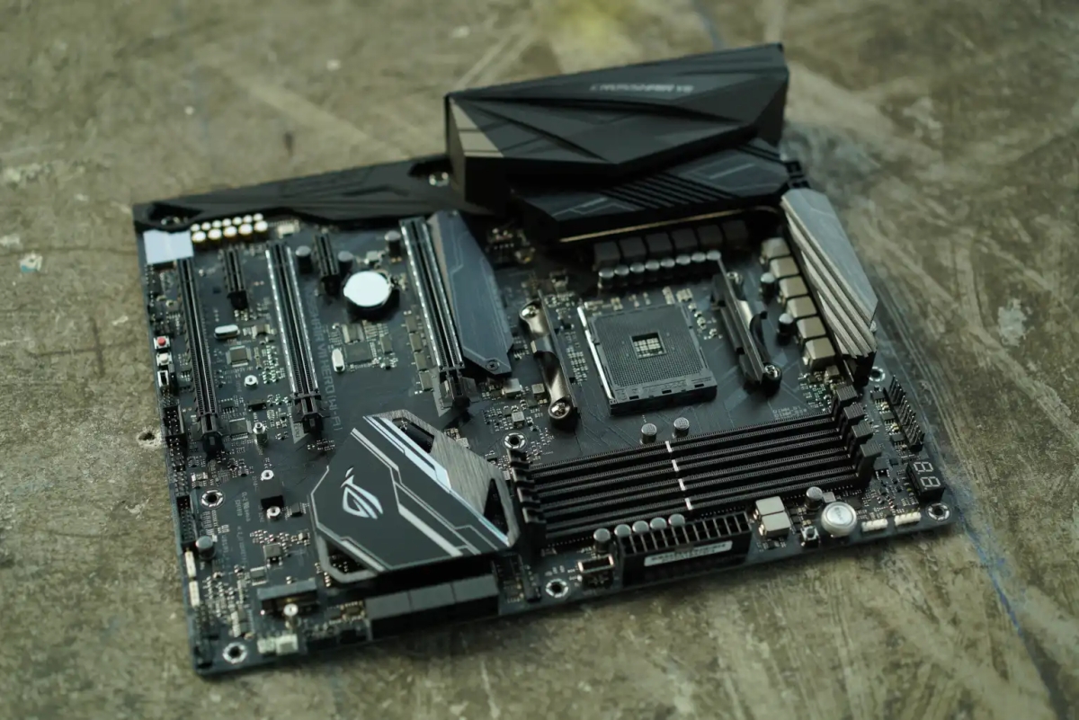 AMD AM4 X370 motherboard on a concrete floor