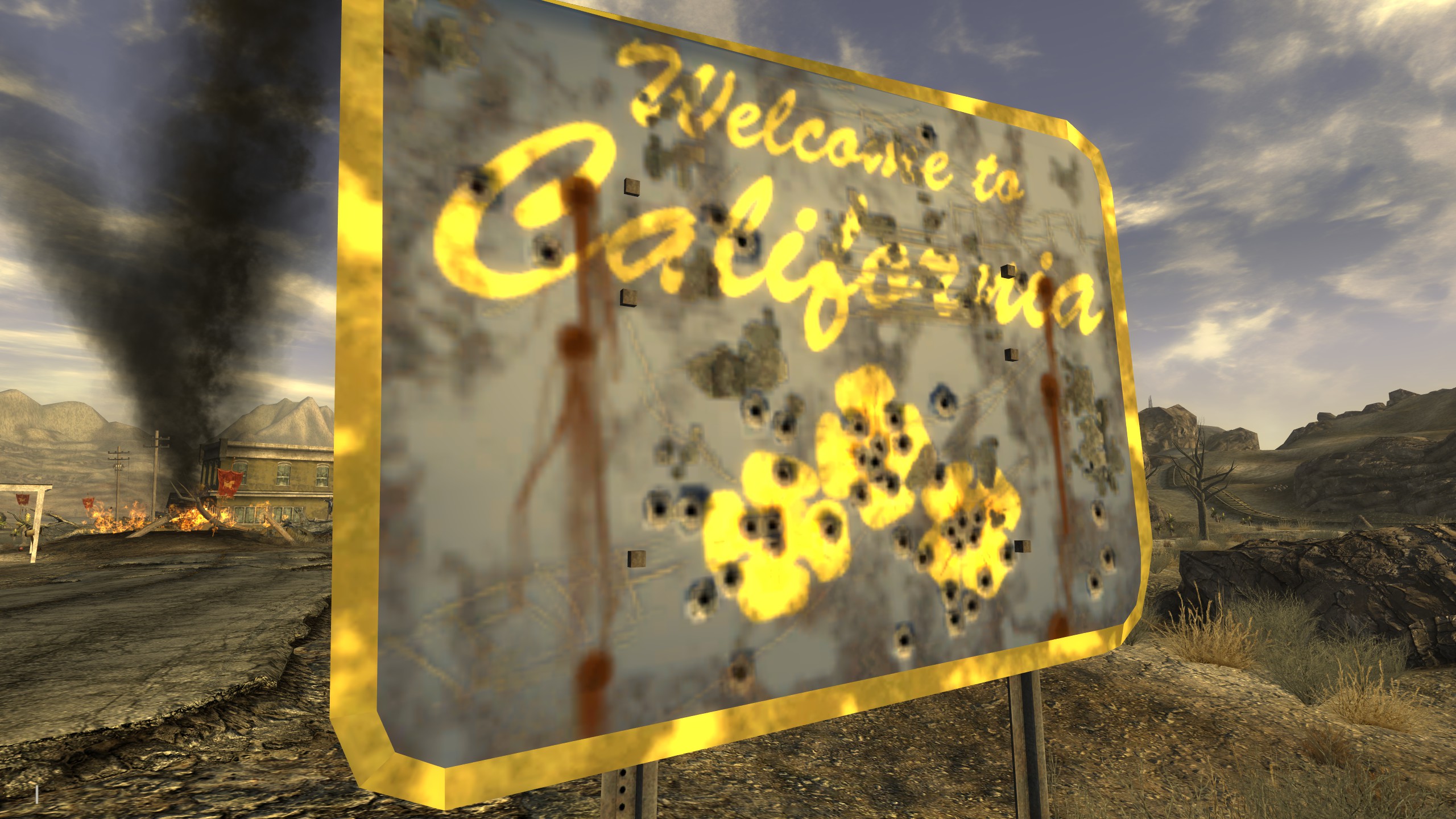 Uma placa cheia de balas diz Bem-vindo à Califórnia