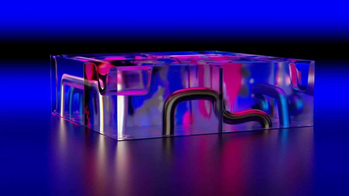 Kuva sinisestä ja mustasta kaltevuusavaruudesta, jossa on 3D-mallinnus läpikuultavasta suorakulmiosta, jonka sisällä on putkia.