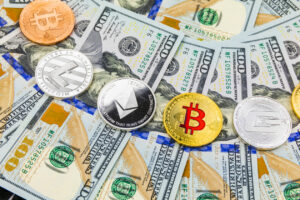 Bitcoin, Ether spadają wraz z większością 10 najlepszych kryptowalut; Kontrakty futures w USA rosną przed negocjacjami w sprawie limitu zadłużenia