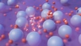 Impresión artística de electrones (representados por pequeñas bolas rojas) colisionando dentro de la estructura atómica no uniforme (representada por esferas más grandes de color gris azulado) de un metal extraño.