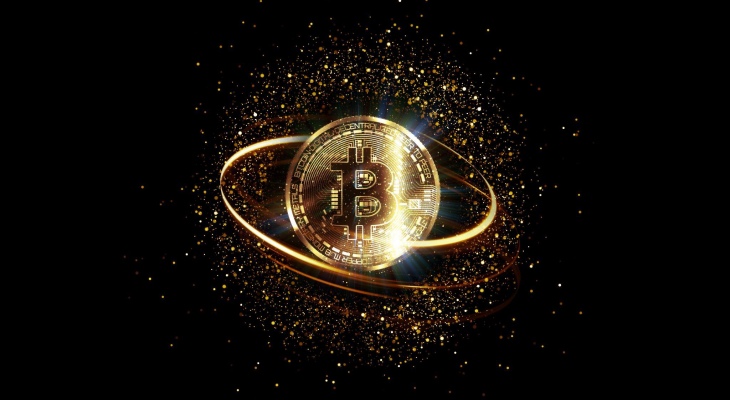 pièce d'or avec symbole bitcoin