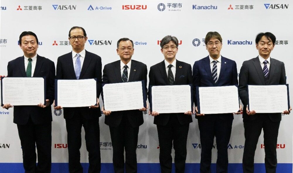 Isuzu sluit zich aan bij een multibelangenovereenkomst om regionaal transport te promoten Zelfrijdende DX-bus PoC gelanceerd in de stad Hiratsuka