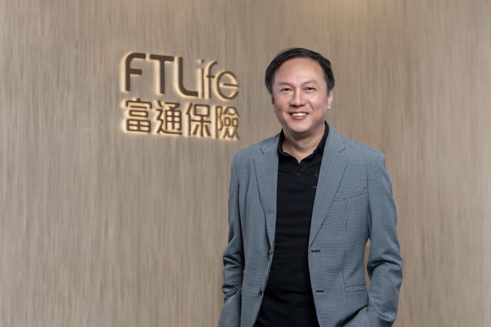 Man Kit Ip, Chief Executive Officer of FTLife