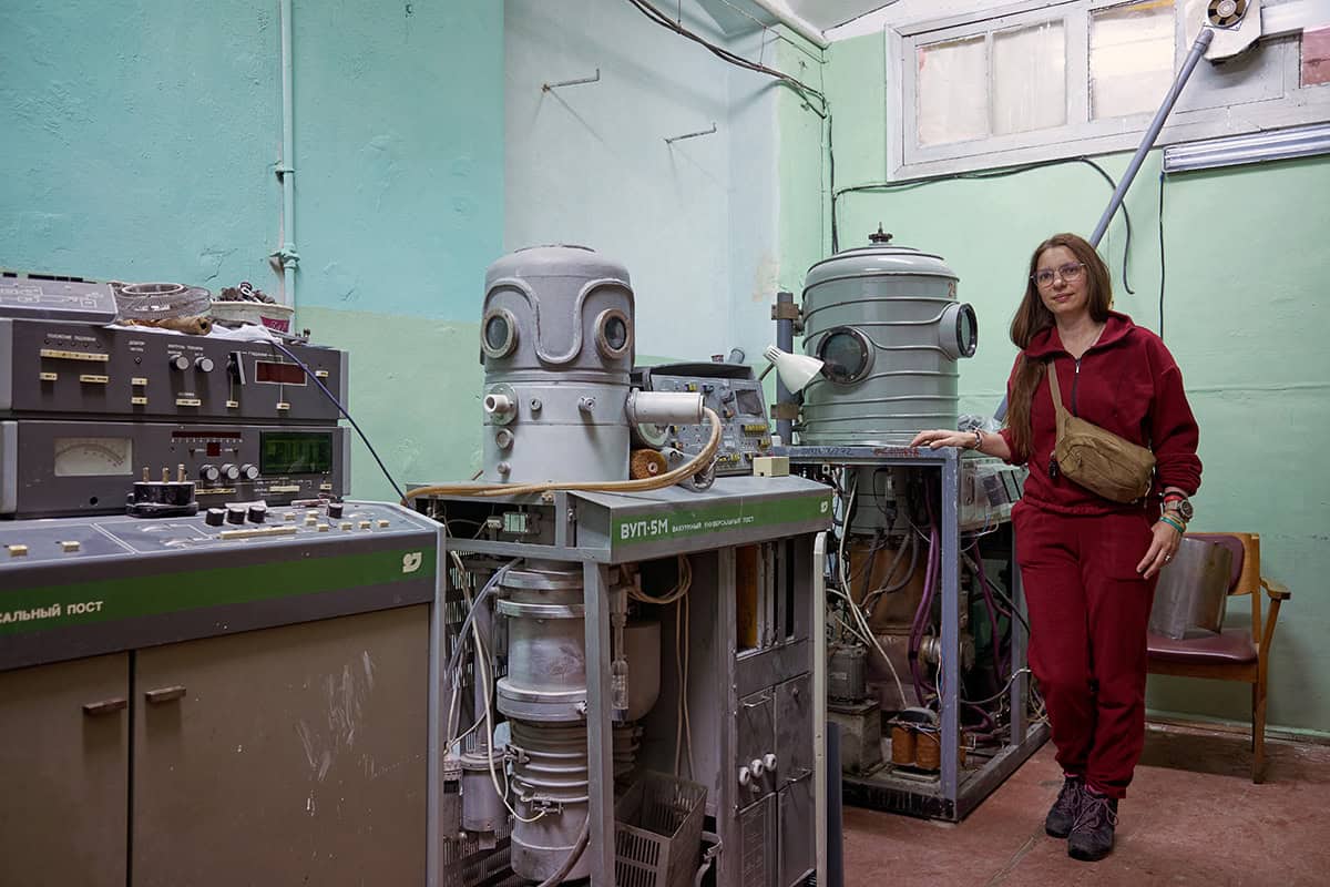 Kseniia Minakova, from the Kharkiv Polytechnic Institute, pictured with equipment recovered from the rubble of the laboratory